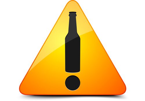 The Dangers of Alcohol - warning sign with alcohol - twin lakes recovery center