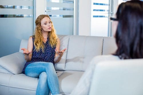 woman talking to therapist