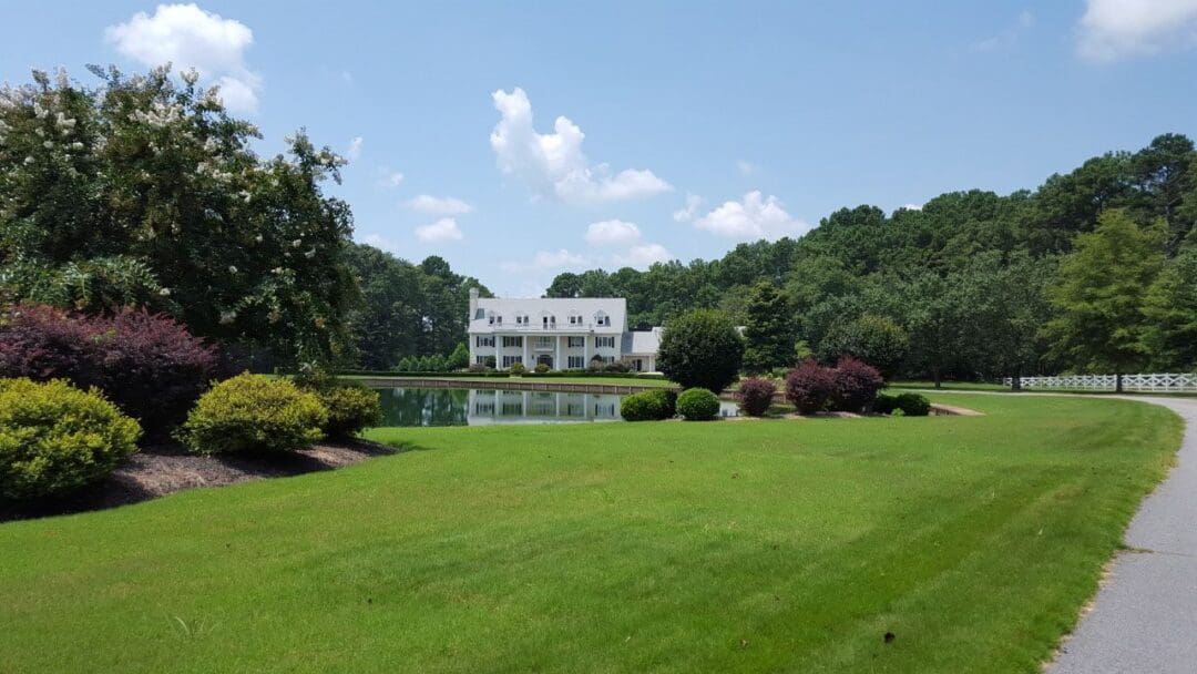 outpatient services, Atlanta Drug & Alcohol Rehab Addiction Treatment Center, gorgeous estate seen from across green lawn and lake - Twin Lakes Recovery Center - Georgia addiction treatment center,